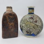 An Iznik style bottle vase, decorated a cat, 17 cm high, and another, 18 cm high (2) Various