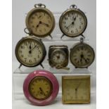 Assorted small alarm clocks, and other items