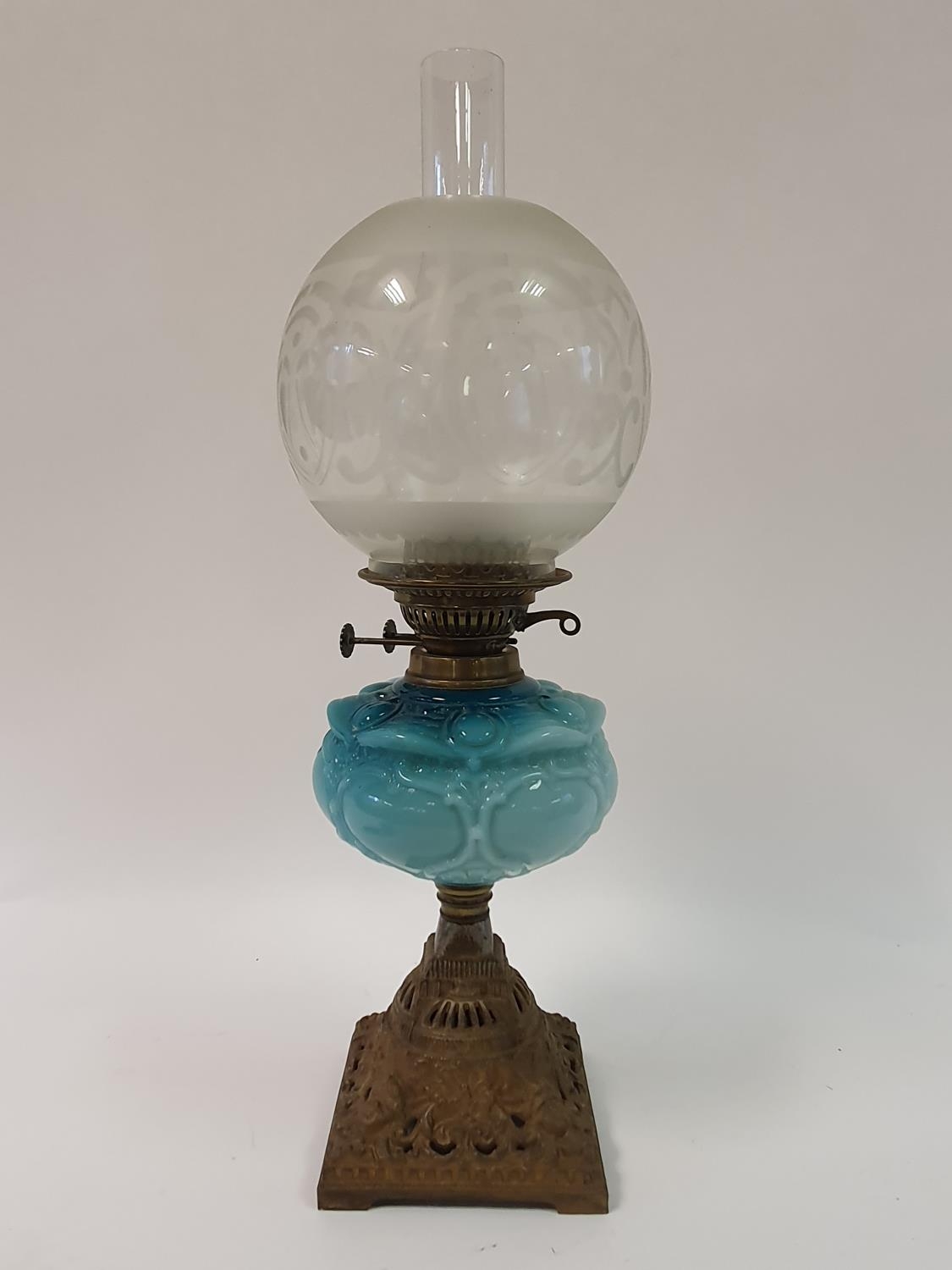 An oil lamp, with a blue glass well, two silver tea spoons and various other items (box) cannot