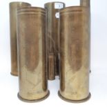 A pair of WWI trench art brass shell cases, 'Souveir (sic) of the Great Fenisking at Villers St
