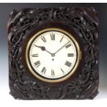 An early 20th century wall clock, the 29 cm diameter painted dial with Roman numerals, fitted a