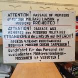 A sign, 'Attention! Passage of Members of foreign Military Liaison Missions Prohibited!', also