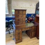 A mahogany pedestal desk, 120 cm wide, and a matching filing cabinet (2)