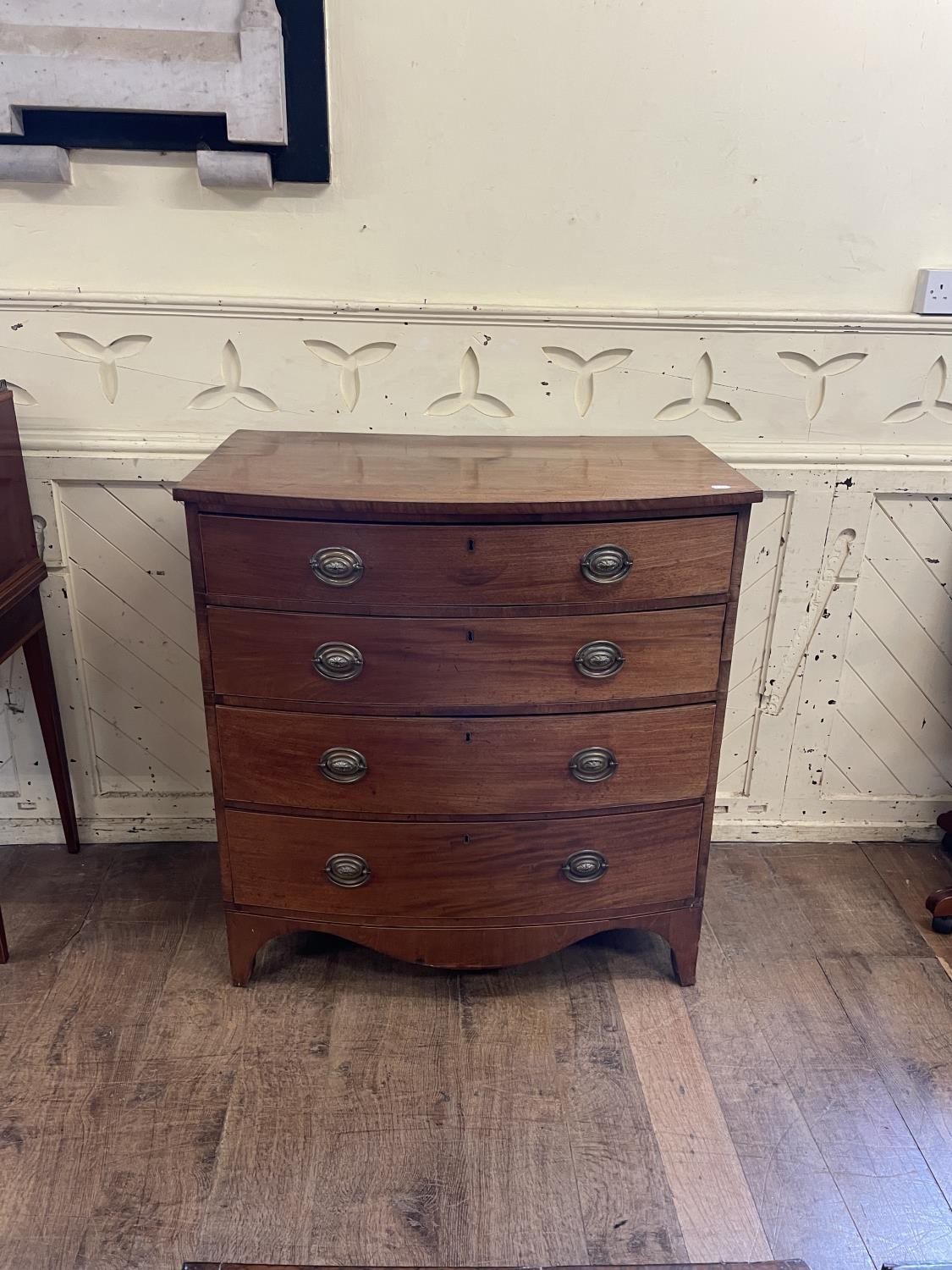 A 19th century mahogany bow front chest, having four long drawers, 98 cm wide