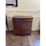 A 19th century mahogany bow front chest, having four long drawers, 98 cm wide