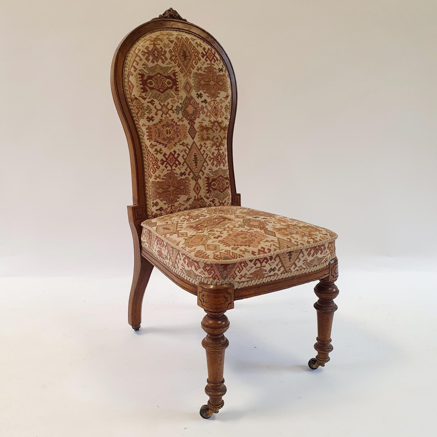 A 19th century mahogany nursing chair