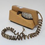 A beige Trim Phone Prop phone