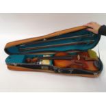 A Chinese violin, with a two piece back, three bows, in case and a miniature violin and bow, in a