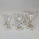 A part suite of 19th century facet cut drinking glasses, comprising six red wine glasses, six