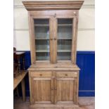 An oak bookcase cabinet, 105 cm wide