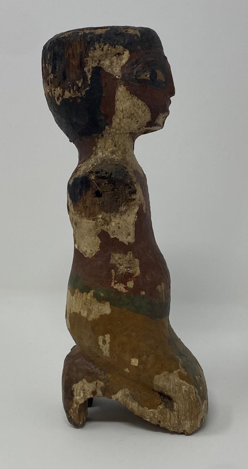 An Egyptian style wooden boatman figure, with painted decoration to face and body 50 cm Purchased - Bild 2 aus 4