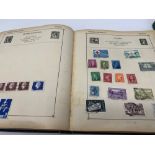 A Strand stamp album, and Lincoln stamp album, of world stamps (2)