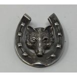 A silver fox head and horseshoe hunting brooch This is a modern copy