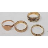 Four 9ct gold rings, 12.0 g