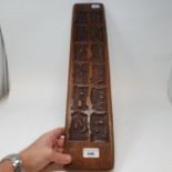 A treen gingerbread mould, 62 cm wide