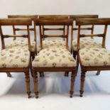 A set of six 19th century rosewood bar back dining chairs, with drop in seats, on turned tapering