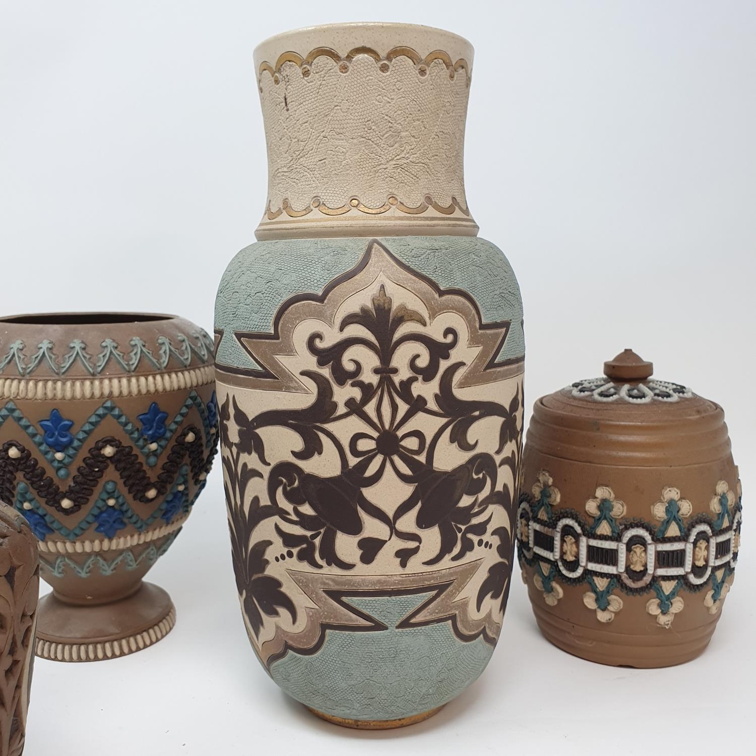 A Doulton Lambeth vase, 27 cm high, a tobacco jar, 15 cm high and three other item (5)