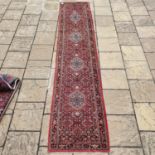 A Persian Tabriz runner, 397 x 82 cm