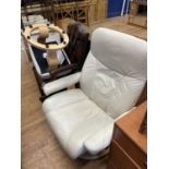 A Stressless leather reclining armchair and stool (2)