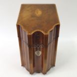 A George III serpentine front mahogany knife box, 23 cm wide gutted