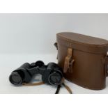 Assorted coins, a pair of binoculars, watches, stamps, and other items Binoculars by Newbold &