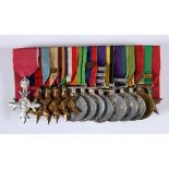 The group of fourteen medals, awarded to Lt Col Frederick Owen Lewis MBE CPM, comprising an MBE (