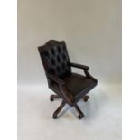 A mahogany and red leather desk chair 44 cm Wide at the back of the seat (where it meets the