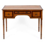 A 19th century kneehole desk, veneered in birdseye maple, having three drawers, on turned tapering