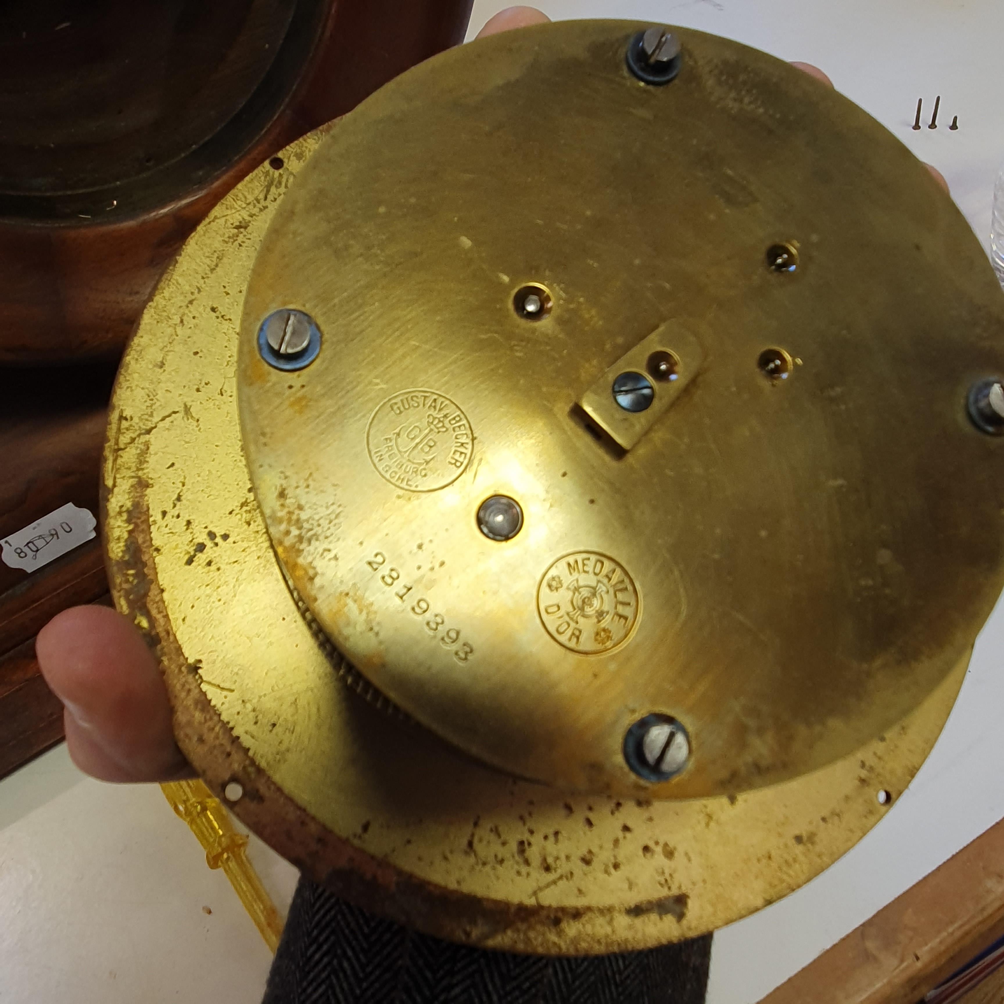 An Imperial German Navy bulkhead type clock, the 15 cm diameter silvered dial signed Franz Happe - Image 6 of 11