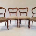 A pair of 19th century rosewood balloon back dining chairs, another pair of chairs, and a stool (5)