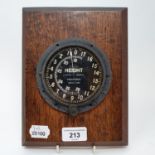 A Short & Mason Mark V B altimeter, 12 cm diameter, mounted on an oak plaque, 23 cm high