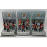 A Britains Scots Guard Four Piece Band, No 8300 boxed, another, and Scots Guard colour party, No