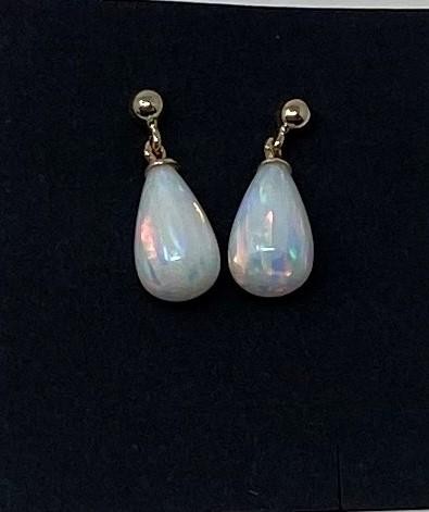 A pair of 9ct gold and opal drop earrings