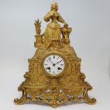 A late Victorian mantel clock, the 7.5 cm diameter enamel dial with Roman numerals, fitted an