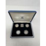 A pair of Victoria Cross silver proof 50p coins, and other similar sets