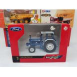 A Britains model tractor, 42416, boxed, and various model toys, all boxed (box)