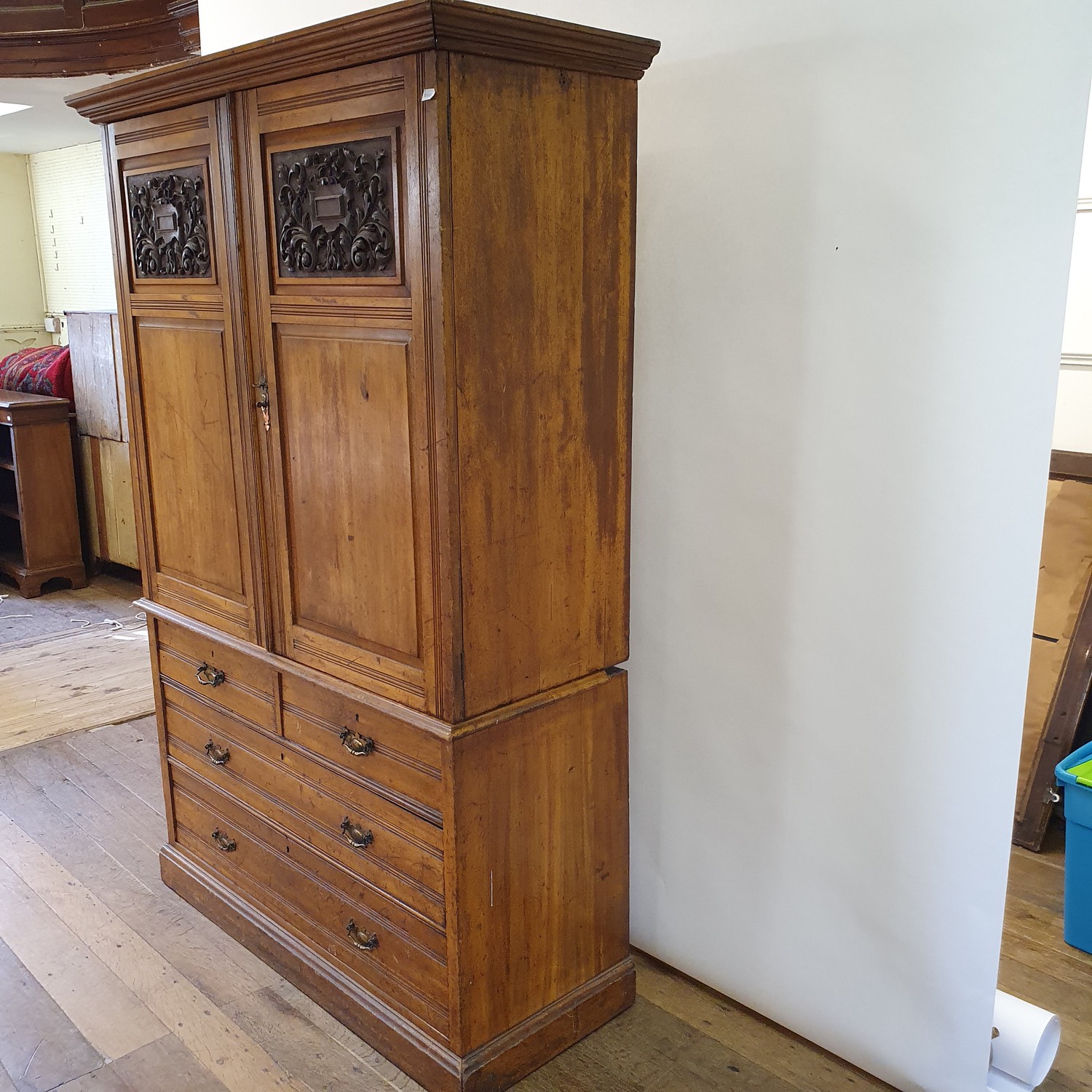 An early 20th century walnut linen press, with two doors, to reveal slides, on a base with two - Image 6 of 7