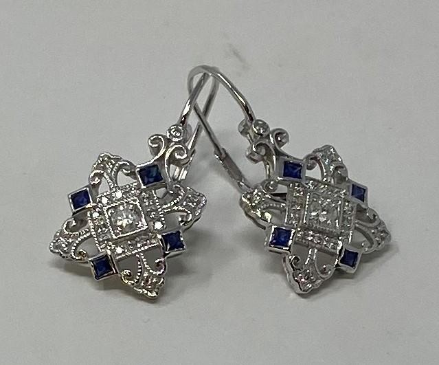 A pair of 9ct gold, sapphire and diamond earrings