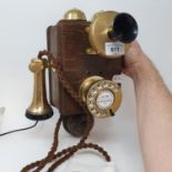 A oak and brass wall mounted phone, GPO 121 Original box, has been converted, this is early 1900