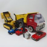 A Tonka digger, and other toys (box)
