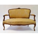 A Continental walnut settee, 130 cm wide