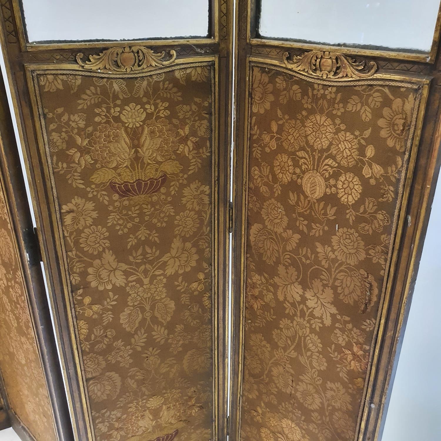 An early 20th century painted four panel screen, the top with glazed sections above silk panels - Image 3 of 5