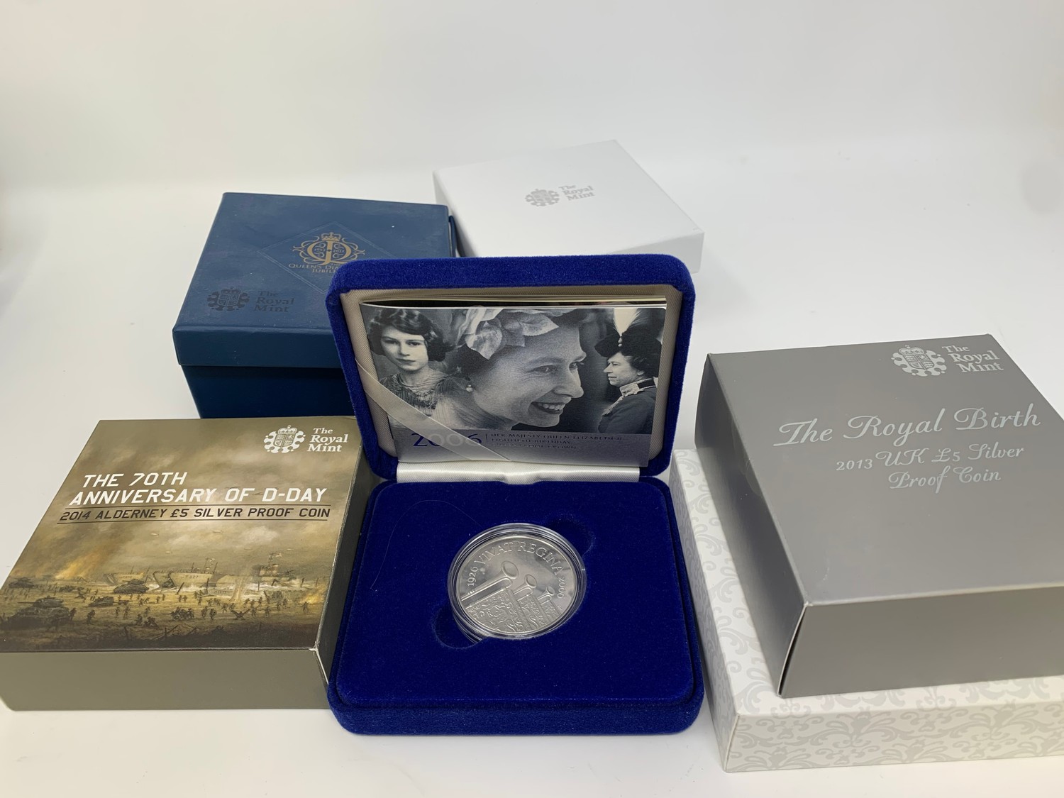 A Royal Birth silver proof coin, 2015, and others similar, all boxed