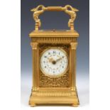 A good carriage clock with repeat, the 5.5 cm diameter dial with Arabic numerals and painted