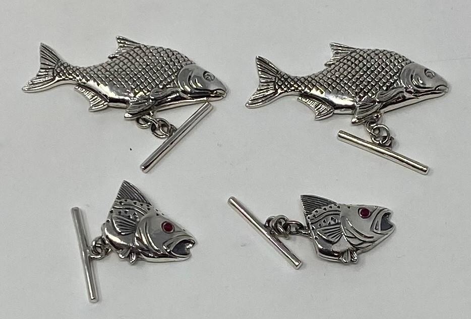 Pair of modern silver cufflinks in the from of fish and another pair (4)