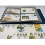 Assorted First Day Covers, and a small group of stamps (box)