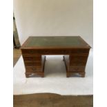 A walnut pedestal desk, 120 cm wide