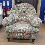 An early 20th century button back armchair