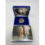 A Queens Coronation 60th Anniversary silver proof £5 coin, 2013, and five other proof coins, all