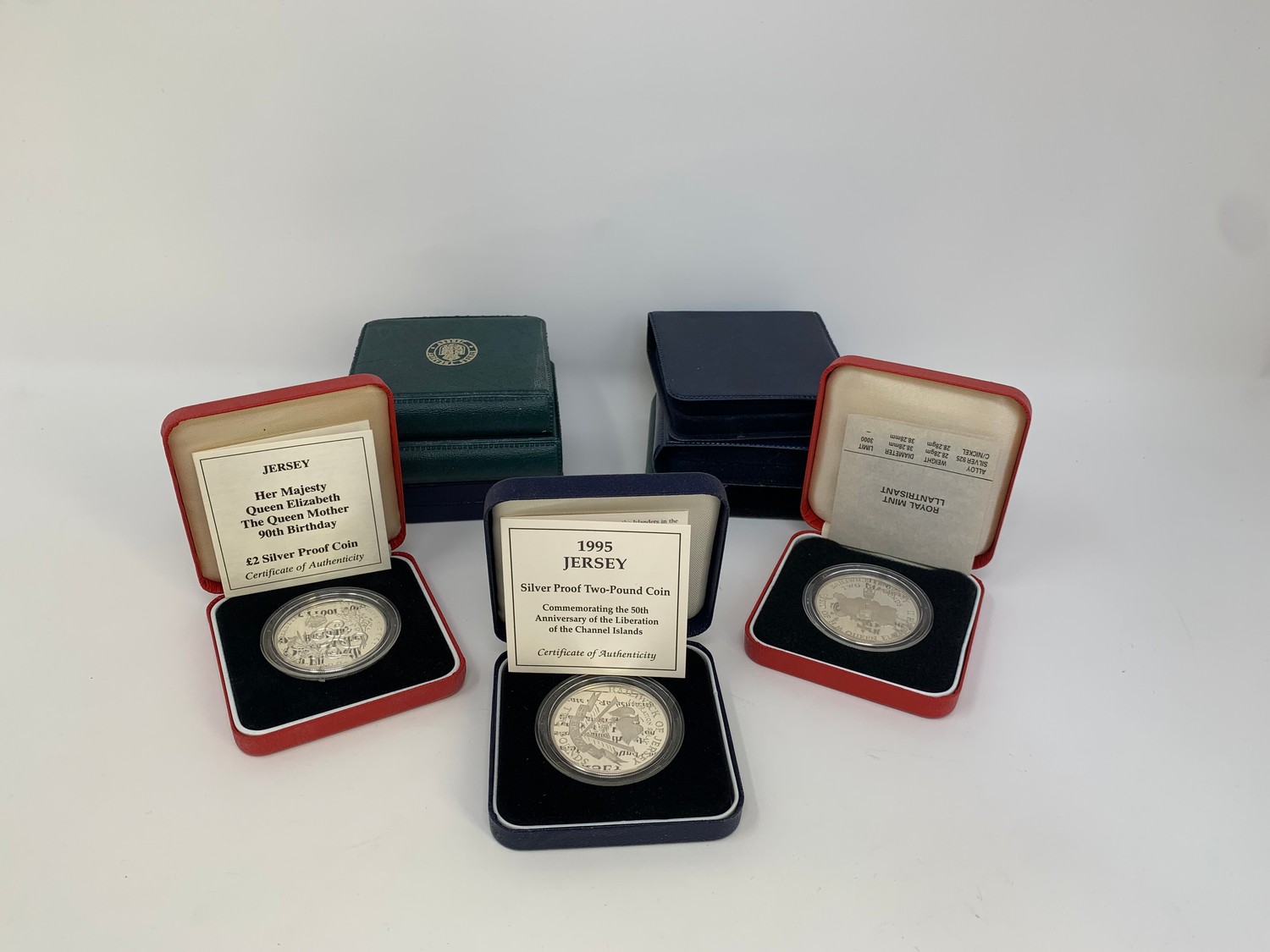 A Jersey silver proof £1 coin, 1989, and others similar, all boxed